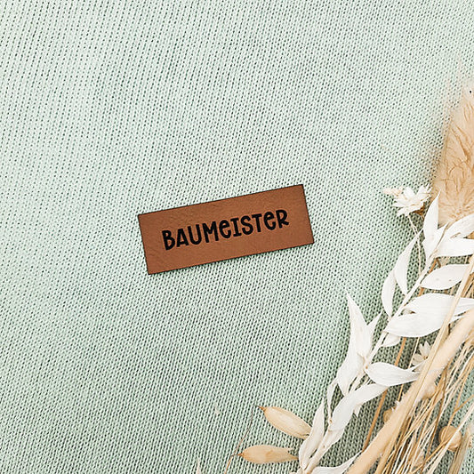 Label aus Kunstleder "Baumeister"