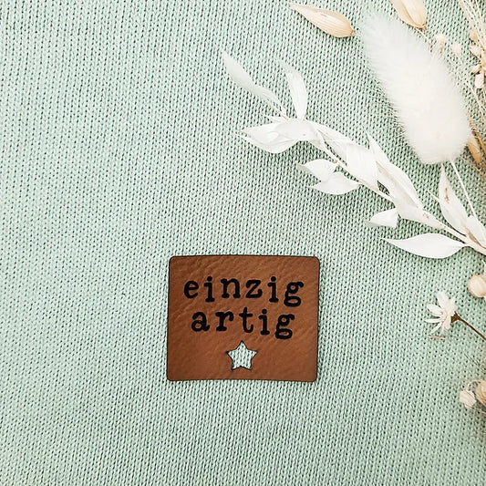 Label aus Kunstleder "einzigartig"