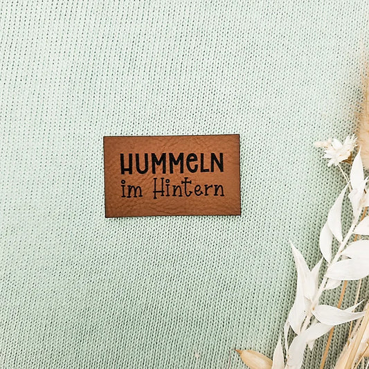 Label aus Kunstleder "Hummeln im Hintern"