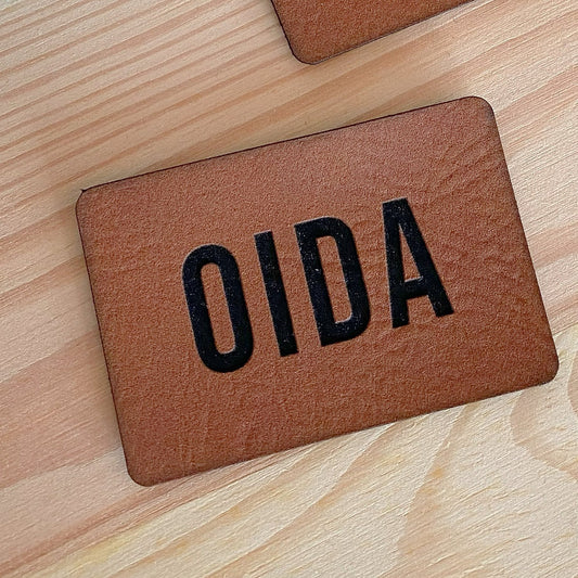 Label aus Kunstleder "OIDA"