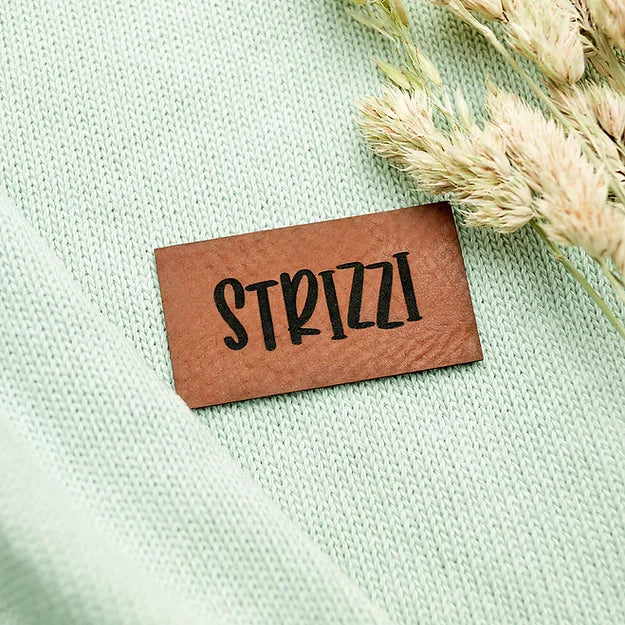 Label aus Kunstleder "STRIZZI"