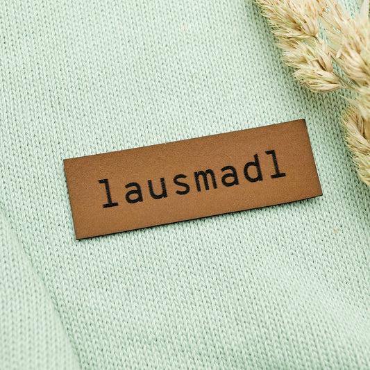 Label aus Kunstleder "Lausmadl"