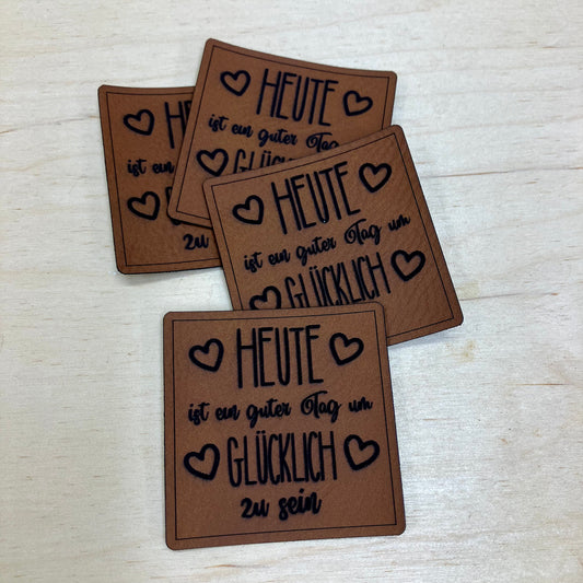 Label aus Kunstleder "Heute ist ein guter Tag"