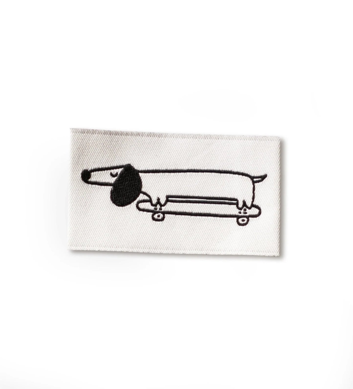*Paul & Clara* Weblabel - Dackel mit Skateboard
